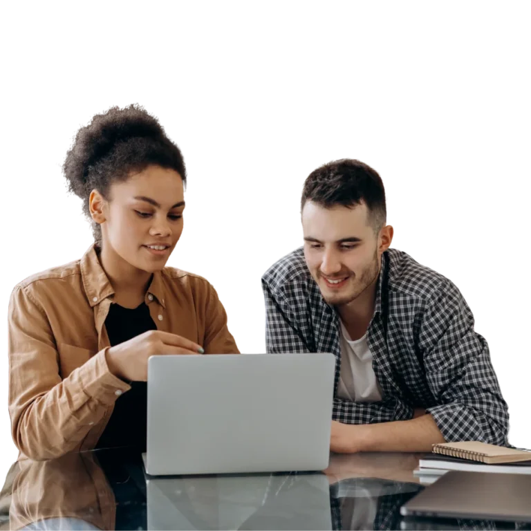 Two young professionals working together on a laptop to help manage the correct distribution of donations