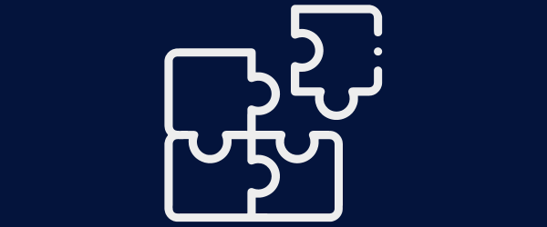 Icon of a jigsaw with pieces of the puzzle coming together